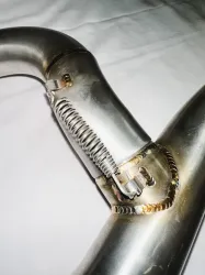 Escape ProTork Powercore 3 Salida Doble con curva Crf 230 Negro + Cacha lateral