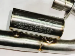 Escape ProTork Powercore 3 Salida Doble con curva Crf 230 Negro + Cacha lateral