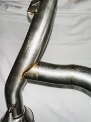 Escape ProTork Powercore 3 Salida Doble con curva Crf 230 Negro + Cacha lateral